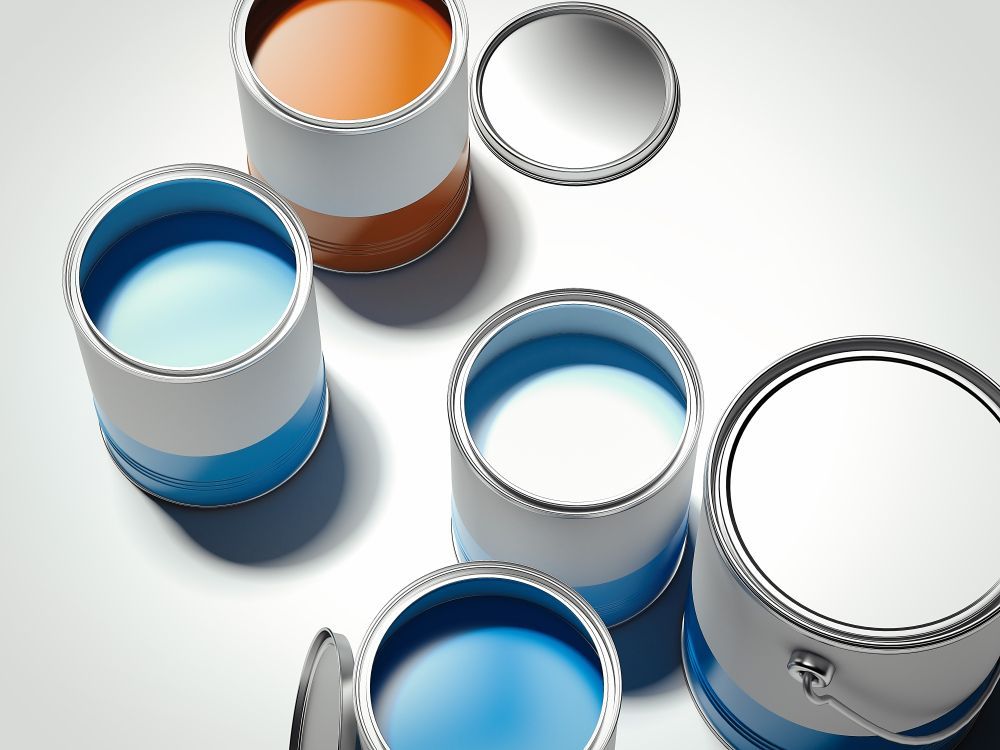 Several Cans Of Paint Are Stacked On Top Of Each Other — Yves De Wilde Quality Painting Services In Lismore, NSW