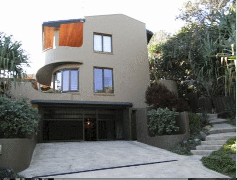 A House With A Garage And Stairs Leading Up To It — Yves De Wilde Quality Painting Services In Lismore, NSW