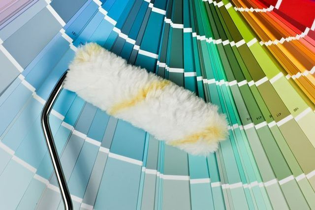 A Paint Roller Is Placed On Top Of A Color Palette — Yves De Wilde Quality Painting Services In Lismore, NSW