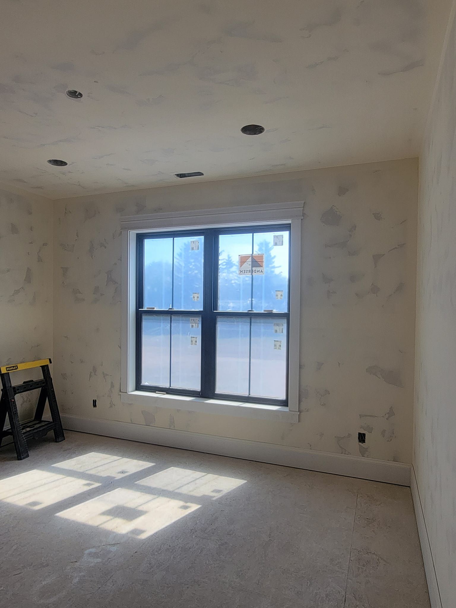There is a window in the middle of the room.