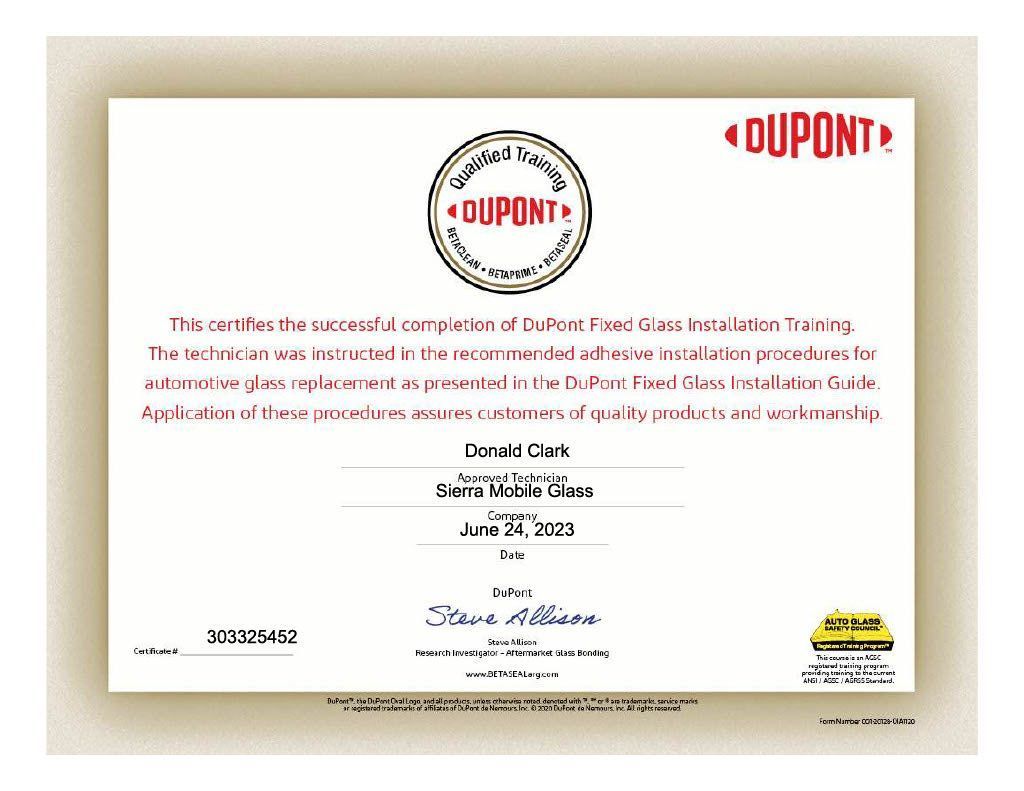 DuPont award certificate with red logo and gold seal on a beige background