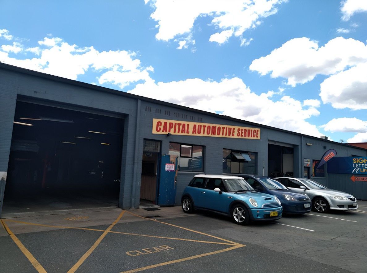 Cars Are Parked in Front of a Building — Capital Automotive Service in Fyshwick, ACT