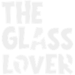 Stylized white text reading “THE GLASS LOVER” on a light gray background