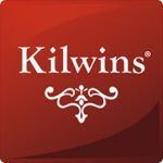 Kilwins logo in white on a red background with decorative flourish