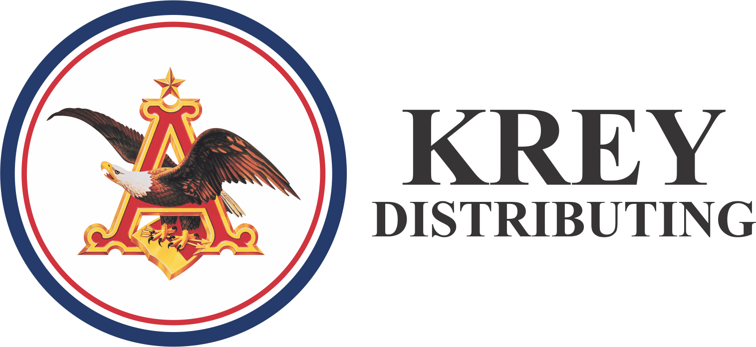 A logo for krey distributing with an eagle on it