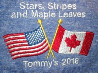 An american flag and a canadian flag are crossed over each other