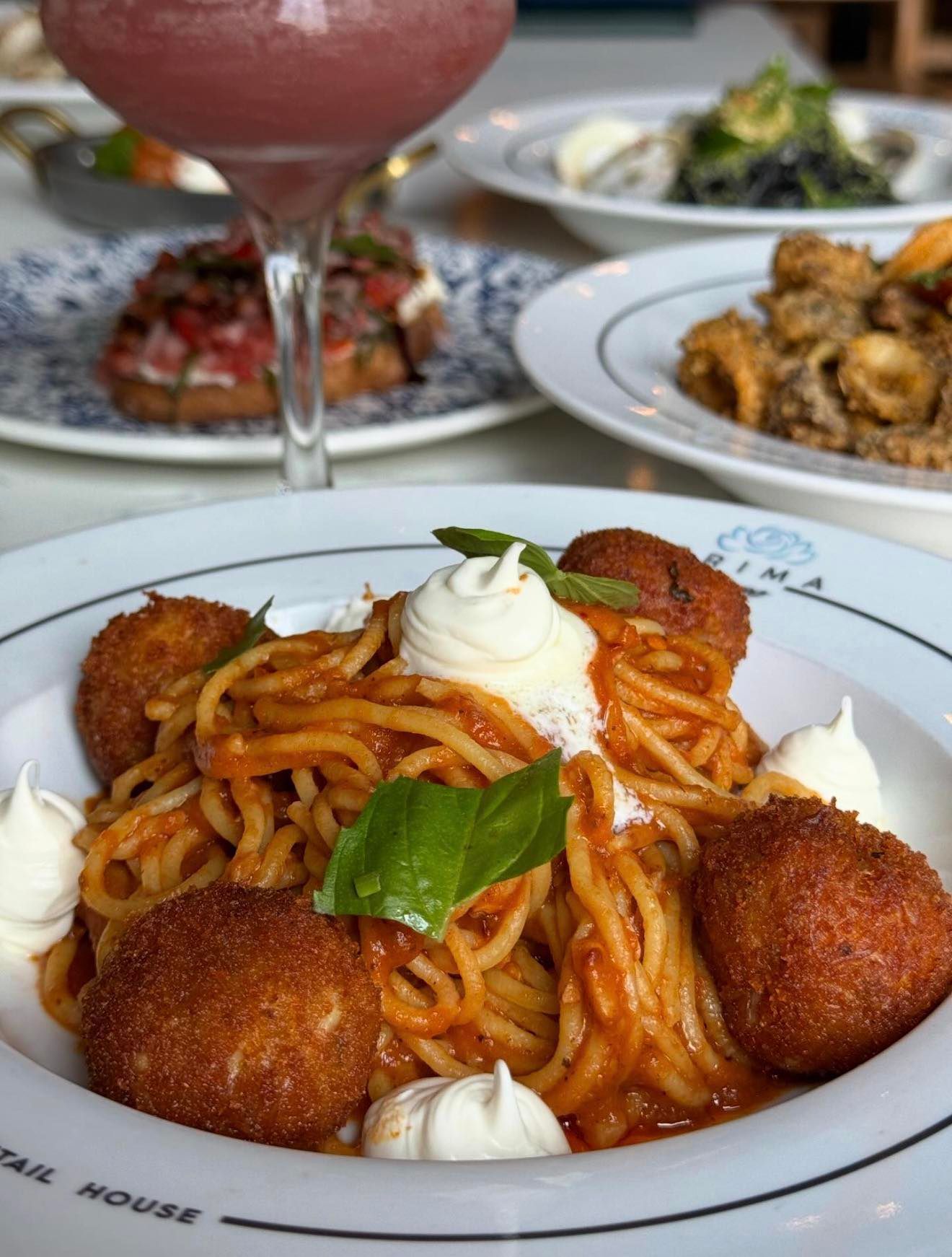 Prima dopo spicy crab spaghetti topped with crab croquettes