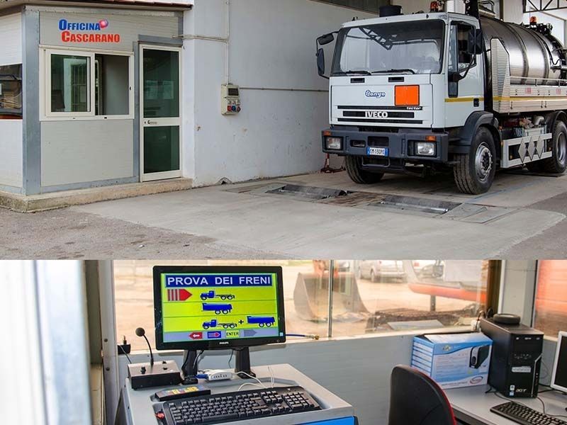 Esterno dell’ufficio di una stazione di servizio, con un’autocisterna parcheggiata fuori e un bancone di servizio all’interno