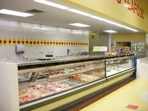 A butcher shop with a sign that says seafood