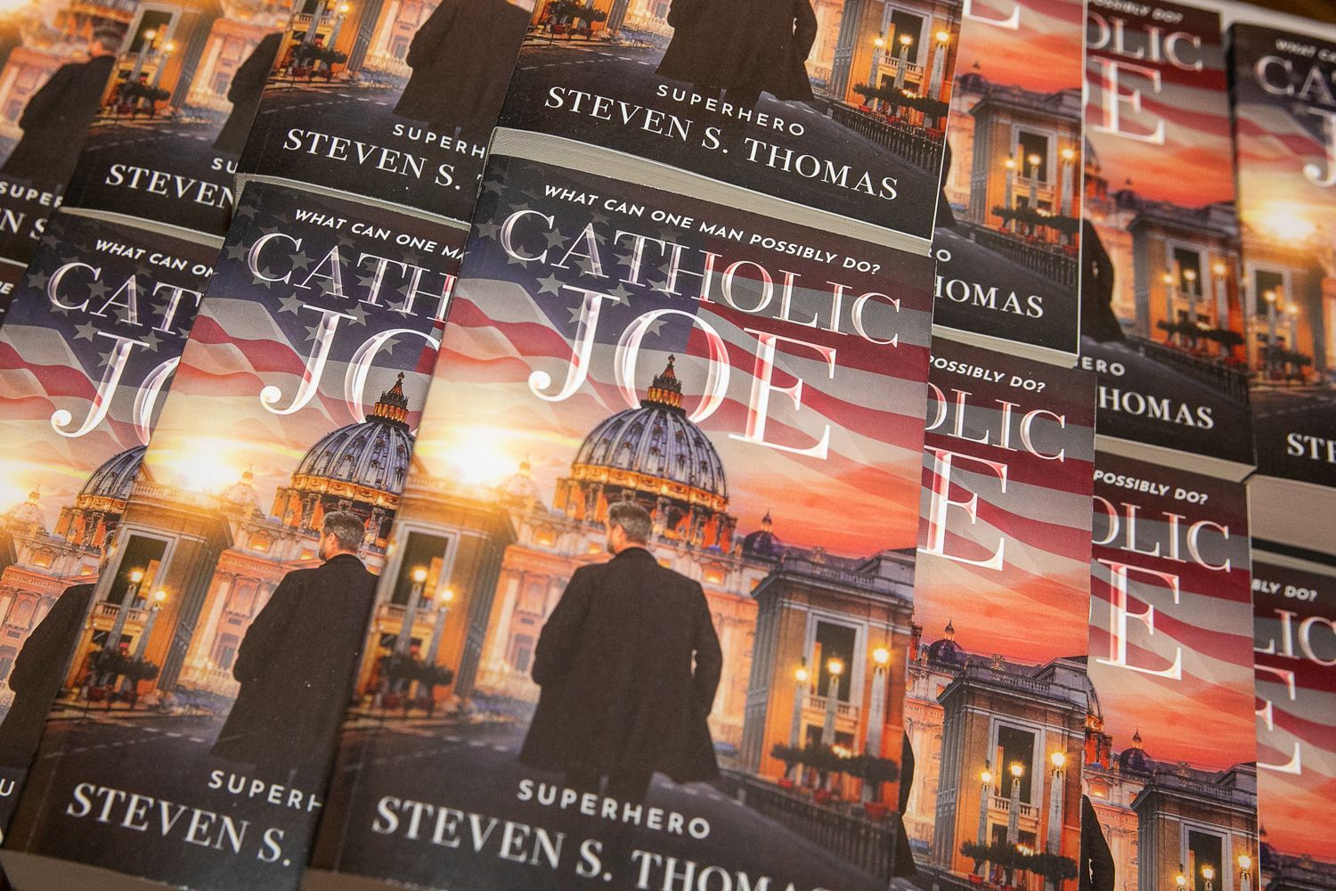 Stack of Stephen S. Thomas “Superhero 3” book covers with a warm orange cityscape and silhouette of a superhero skyline