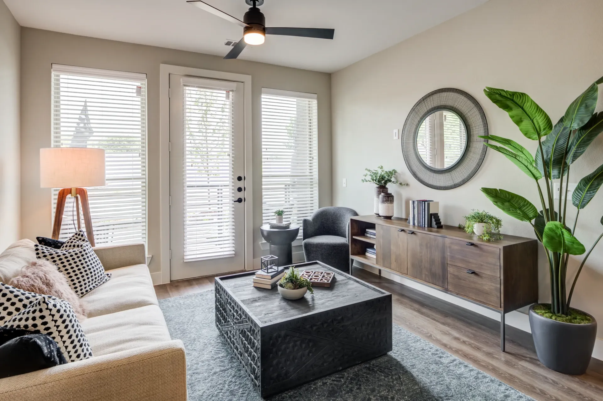 Living room with a sofa, coffee table, and accent chair.