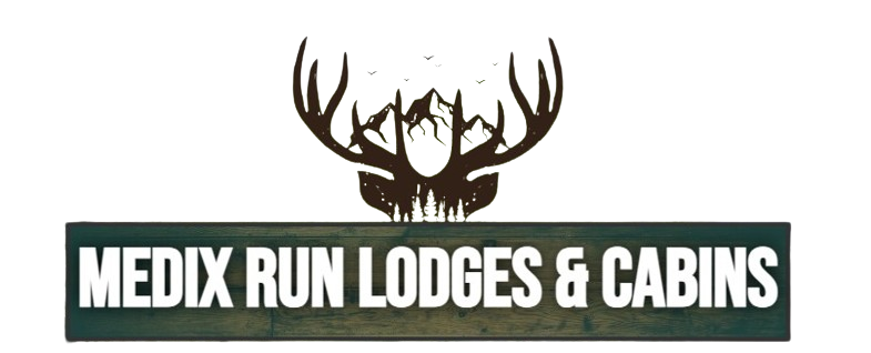 Logo for Medix Run Lodges & Cabins featuring a dark deer antler silhouette with a mountain range inside, above the text.