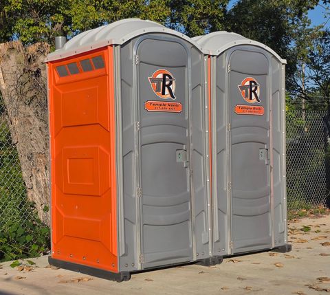 Portable toilet rental on an Indianapolis construction site — Temple Rents Inc delivery