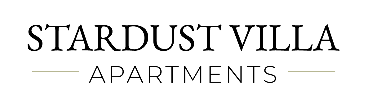 Stardust Villas Apartments logo with black text and a light gray underline and text below.