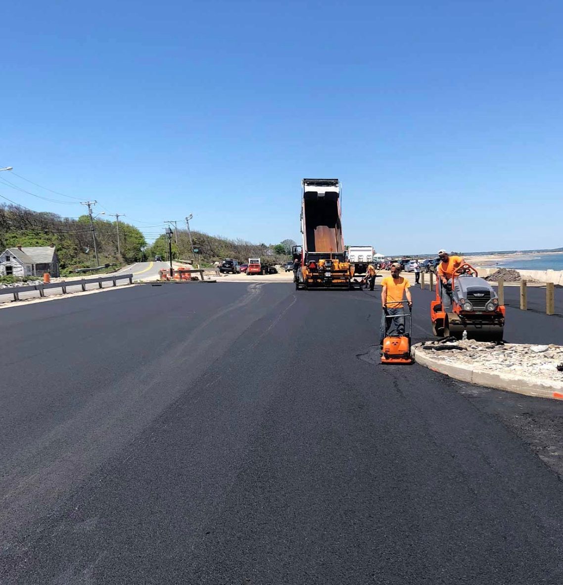 Road paving services in Middleboro, MA - Cape Cod Paving hard at work