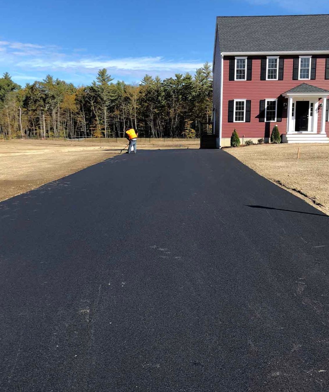 Residential driveway paving in Cape Cod, MA - Cape Cod Paving hard at work