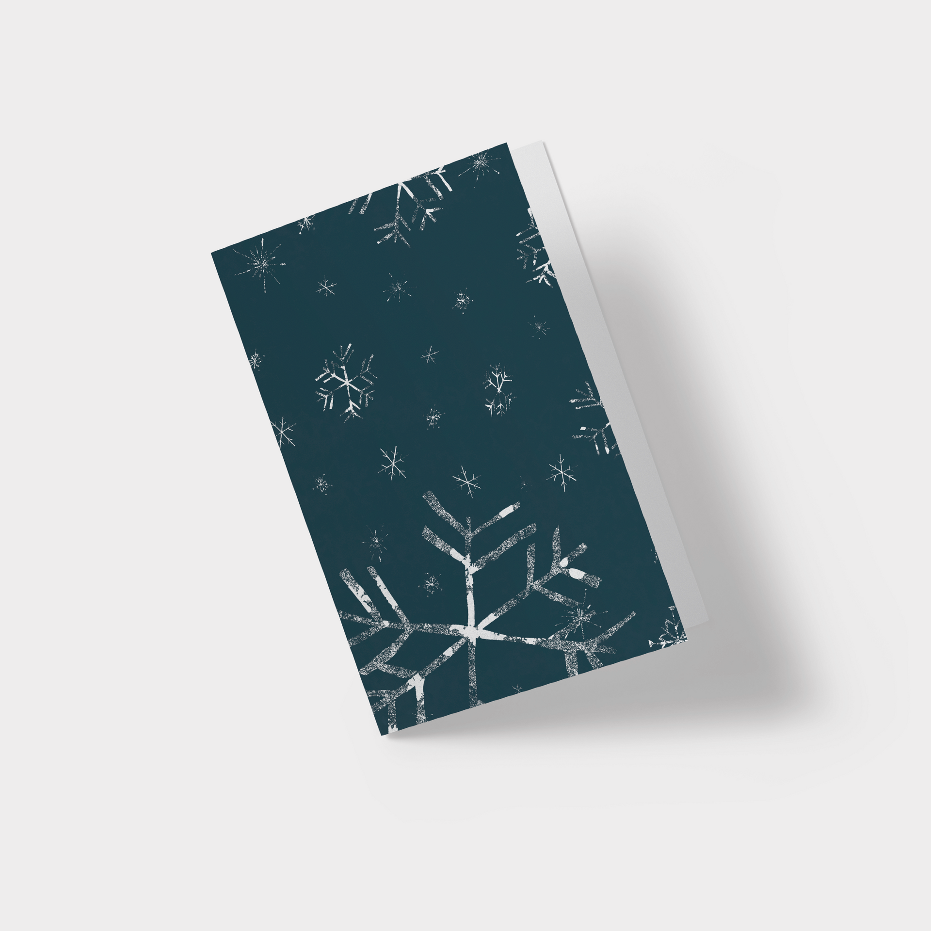 A christmas card with a snowflake on it