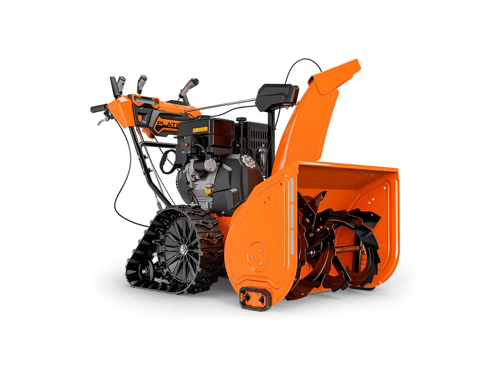 Orange snow blower with black tracks and front auger, shown on a white background