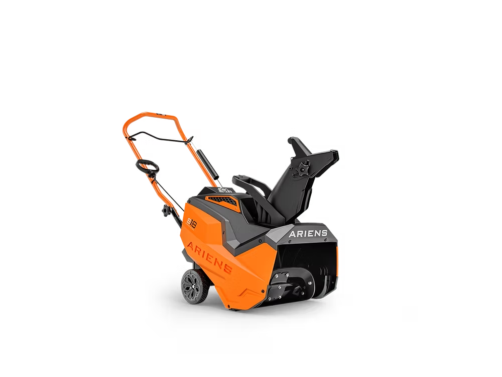 Orange and black snow blower on a white background
