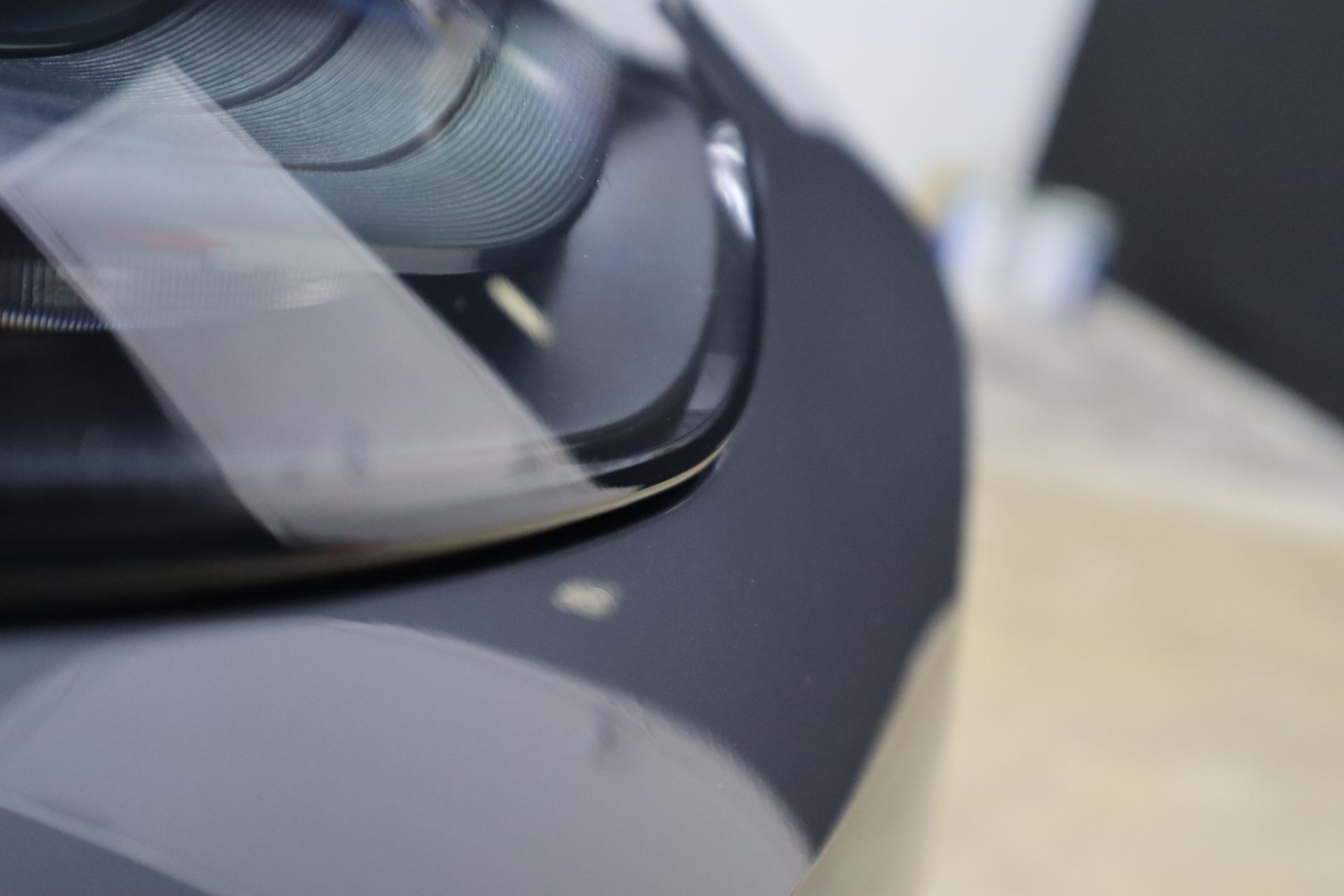 A close up of a helmet sitting on top of a table.
