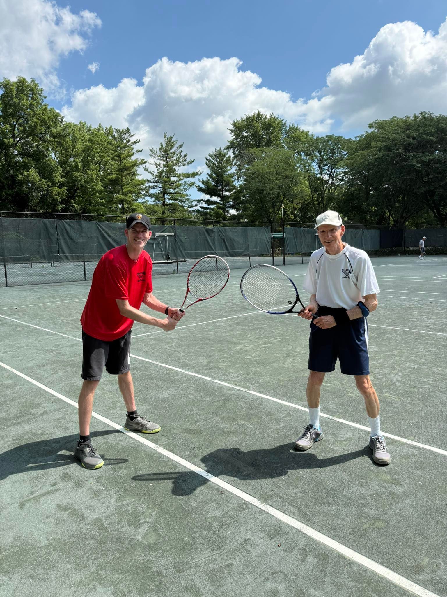 Mark Mandelbaum and father on the tennis court analyzing strategic resilience and adapting under pressure.