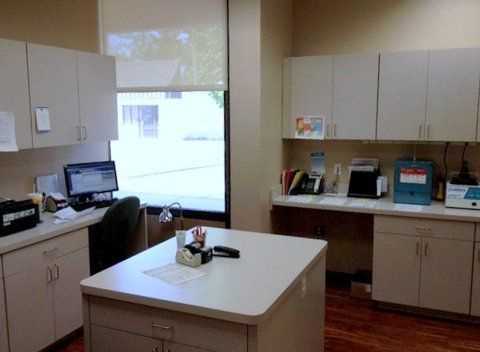 A room with a desk and a computer on it at Advocare Washington Ave Pediatrics in Bergenfield, NJ
