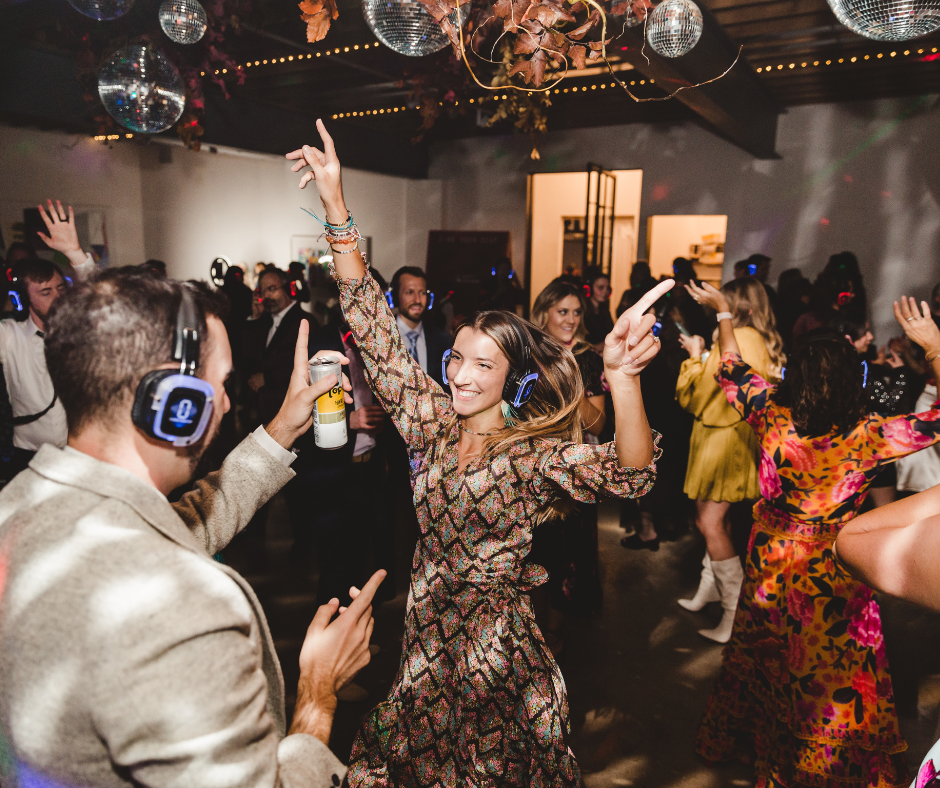girl enjoying a silent disco party with crowd