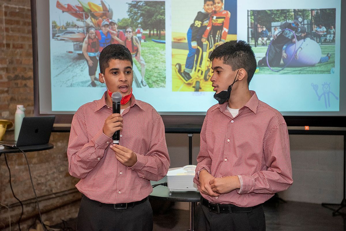 Brother Athlete Speakers in matching red checked dress shirts
