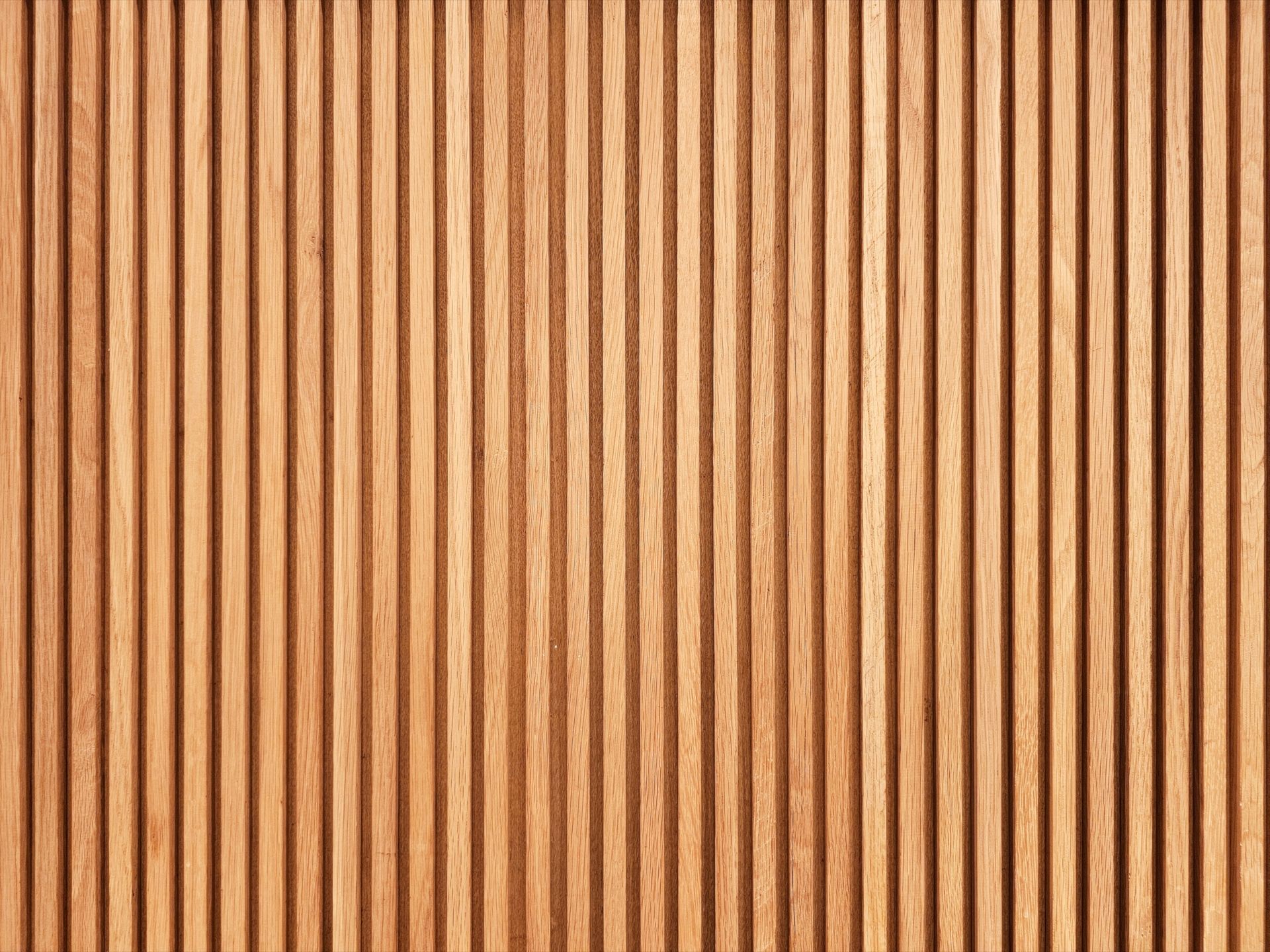 Vertical wooden slats in a light brown pattern