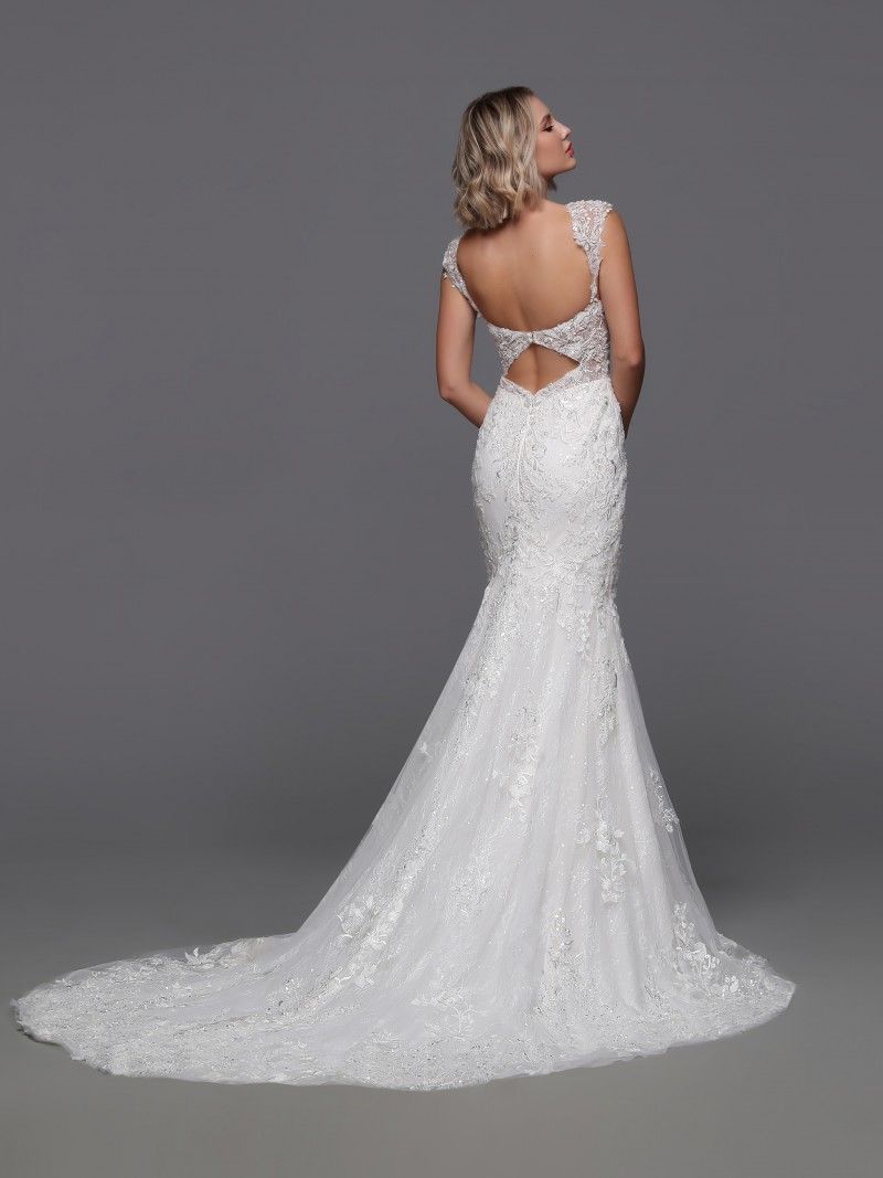 Woman in white lace wedding dress, back view, keyhole back, mermaid silhouette, train.