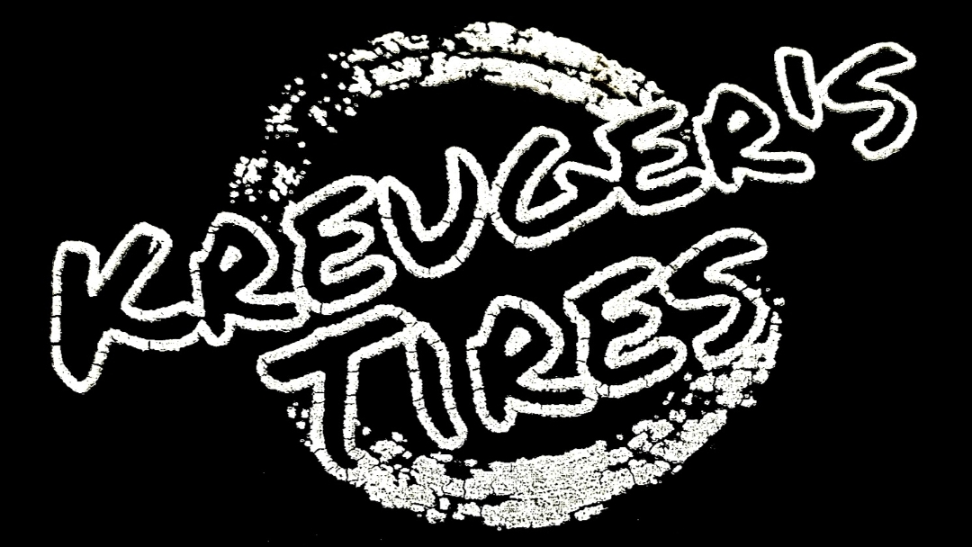 A black and white logo for a company called krueger 's tires.