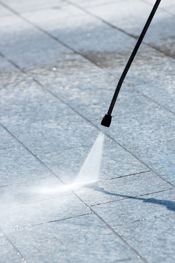 Using a High Pressure Washer to Clean the Outdoor Stone — Highlands Window Cleaning in Mittagong, NSW