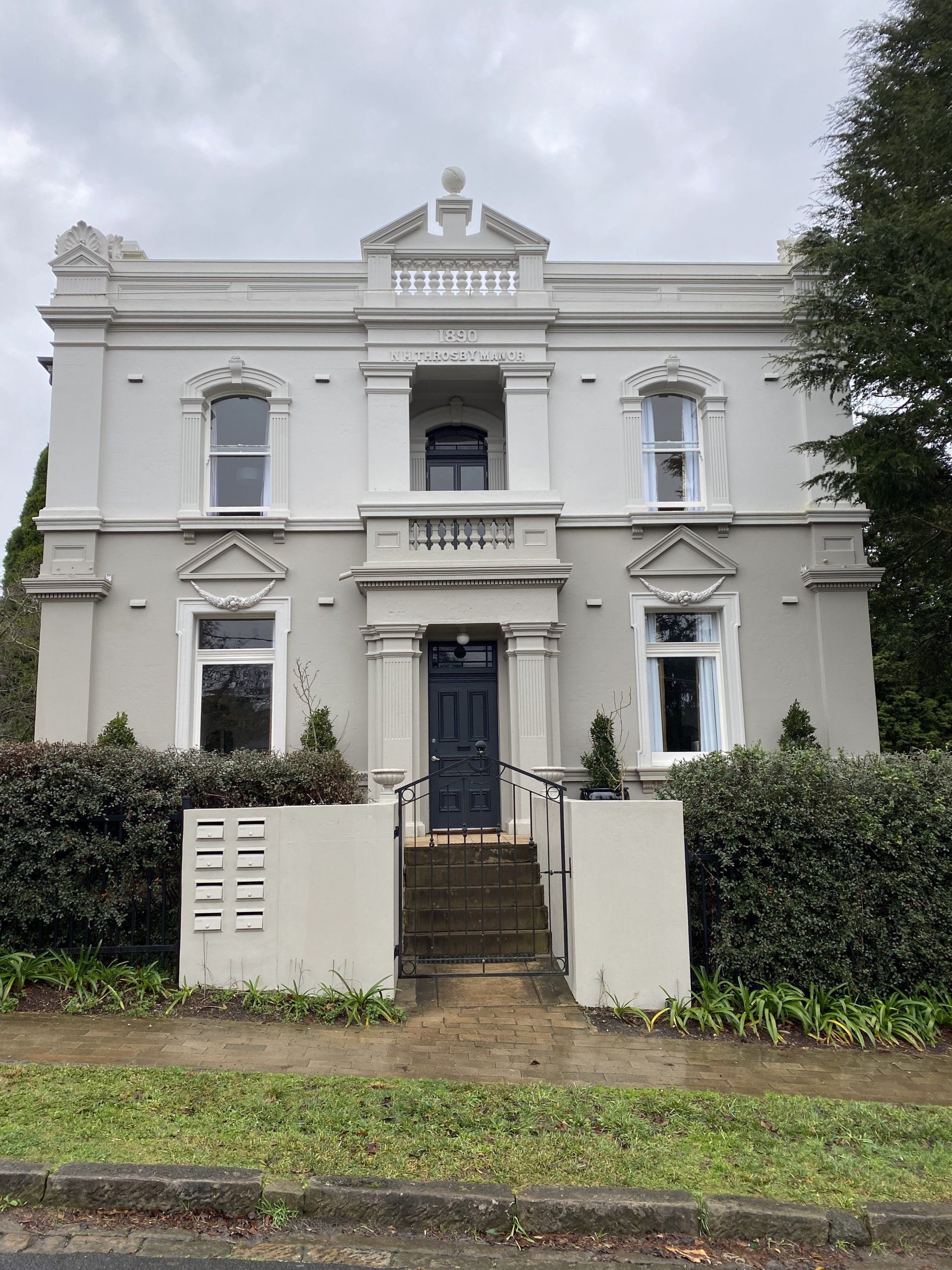 Cleaning the Glass with Sponge and Soap — Highlands Window Cleaning in Mittagong, NSW