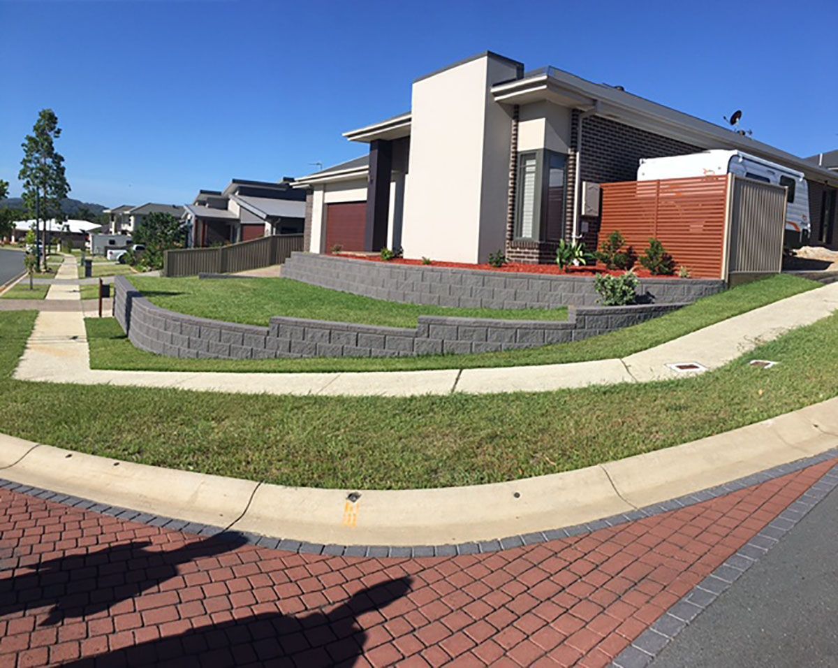 A house with a brick walkway in front of it