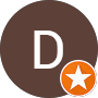 A dark brown circle with a large white letter