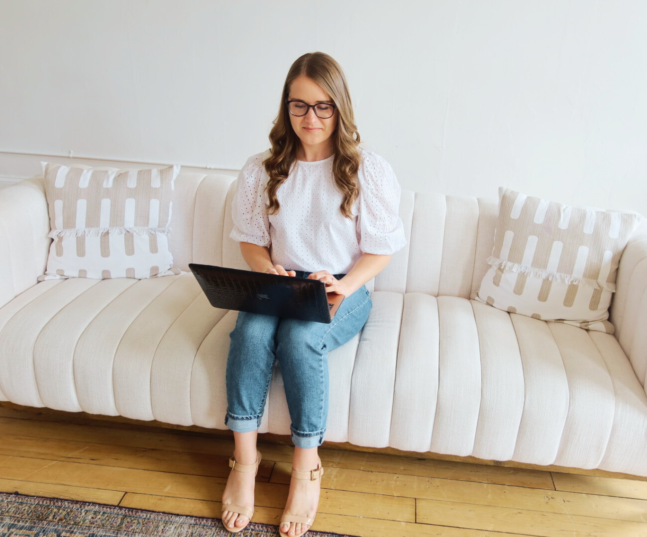 woman on computer looking at why SEO is important