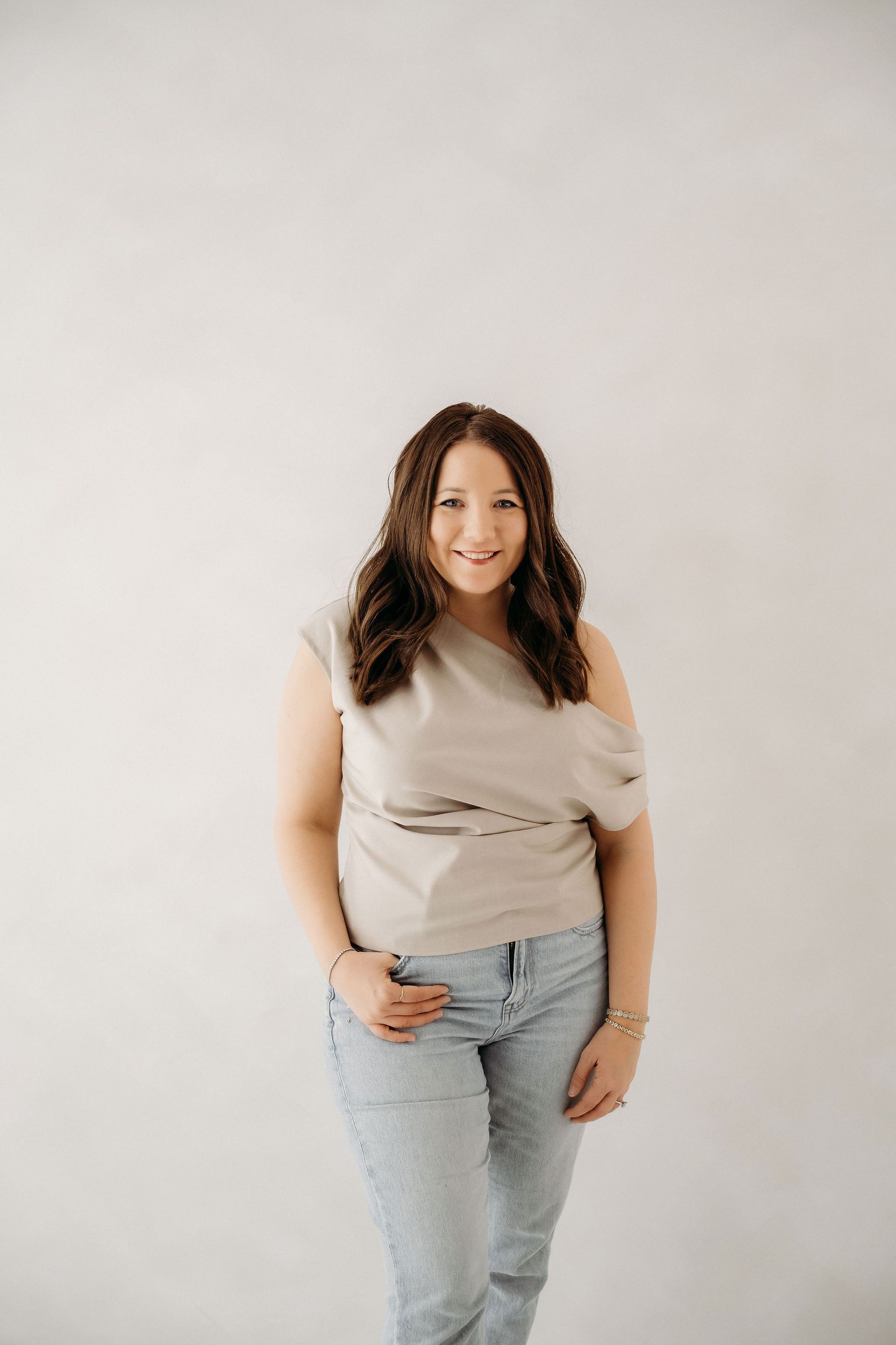 Director of marketing at social media agency sitting on chair