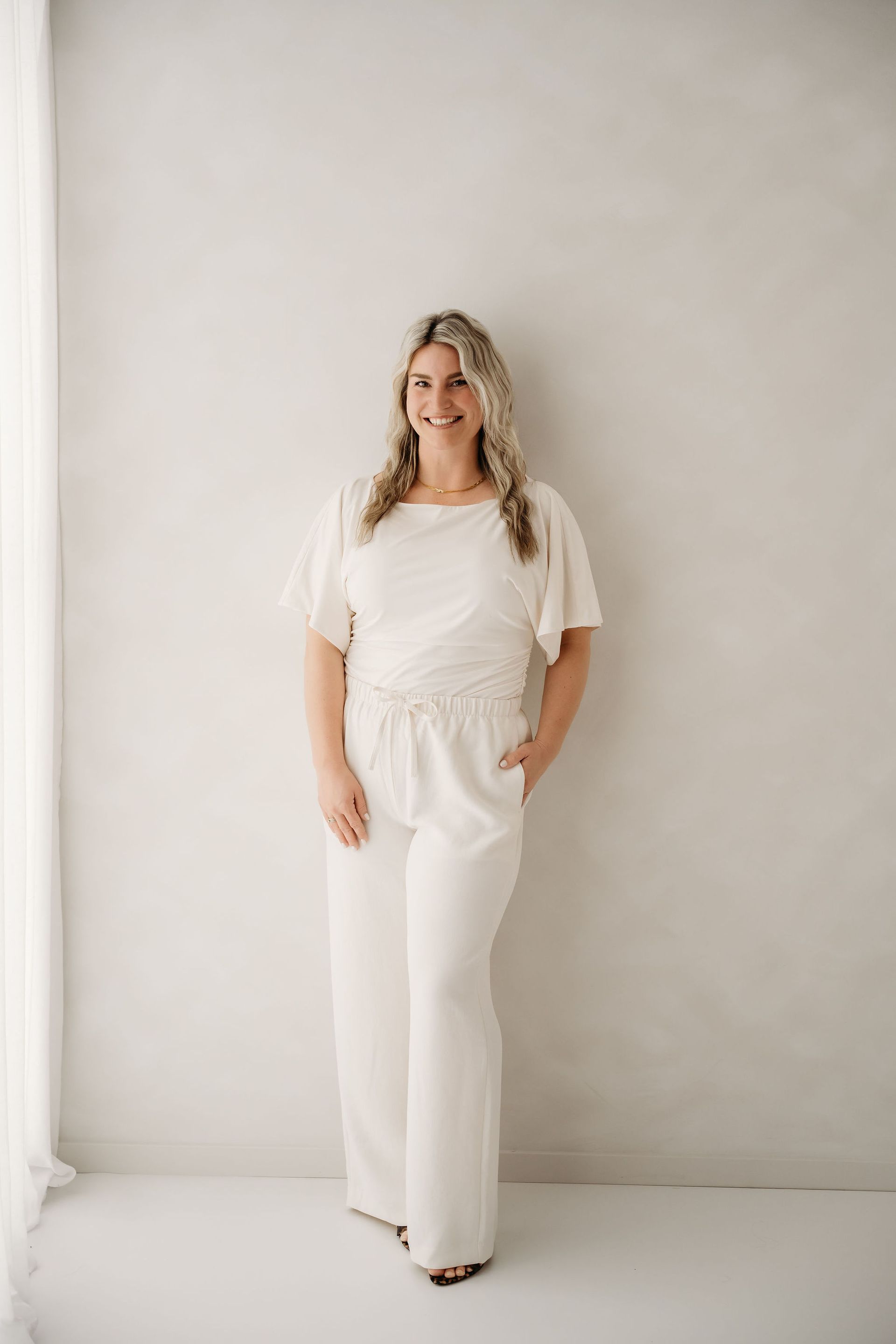 Founder of social media agency posing for a headshot