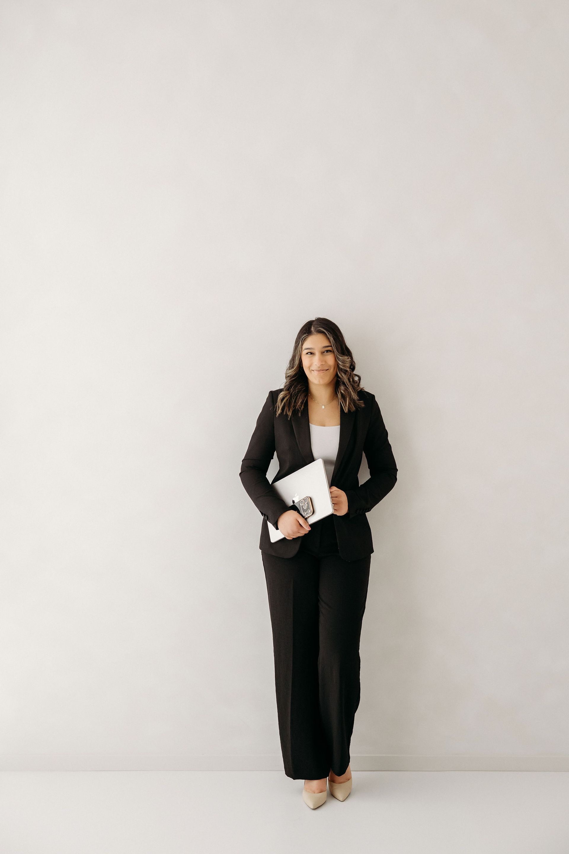 Digital marketer at social media agency smiling for headshot