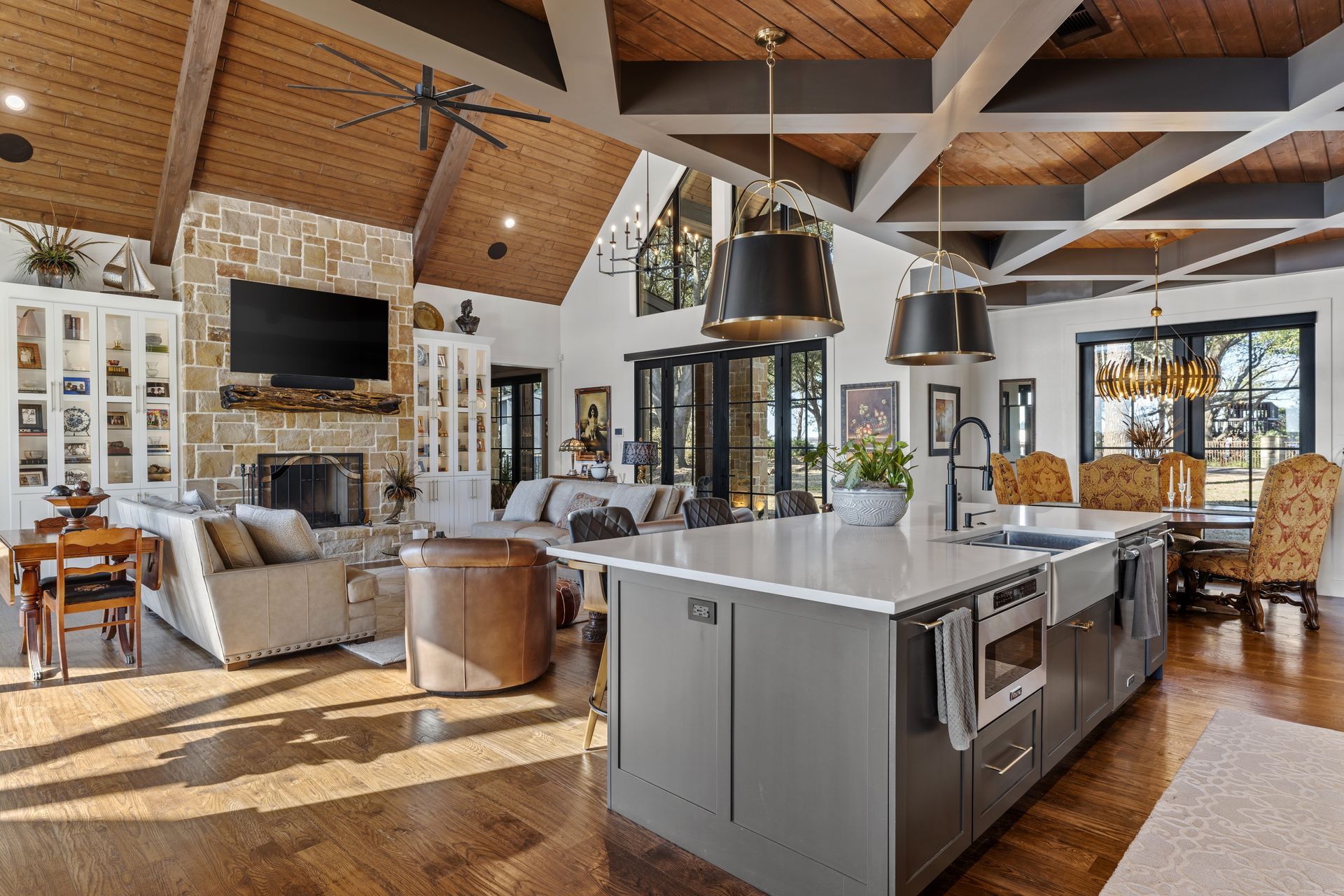A large kitchen with a large island in the middle of the room.