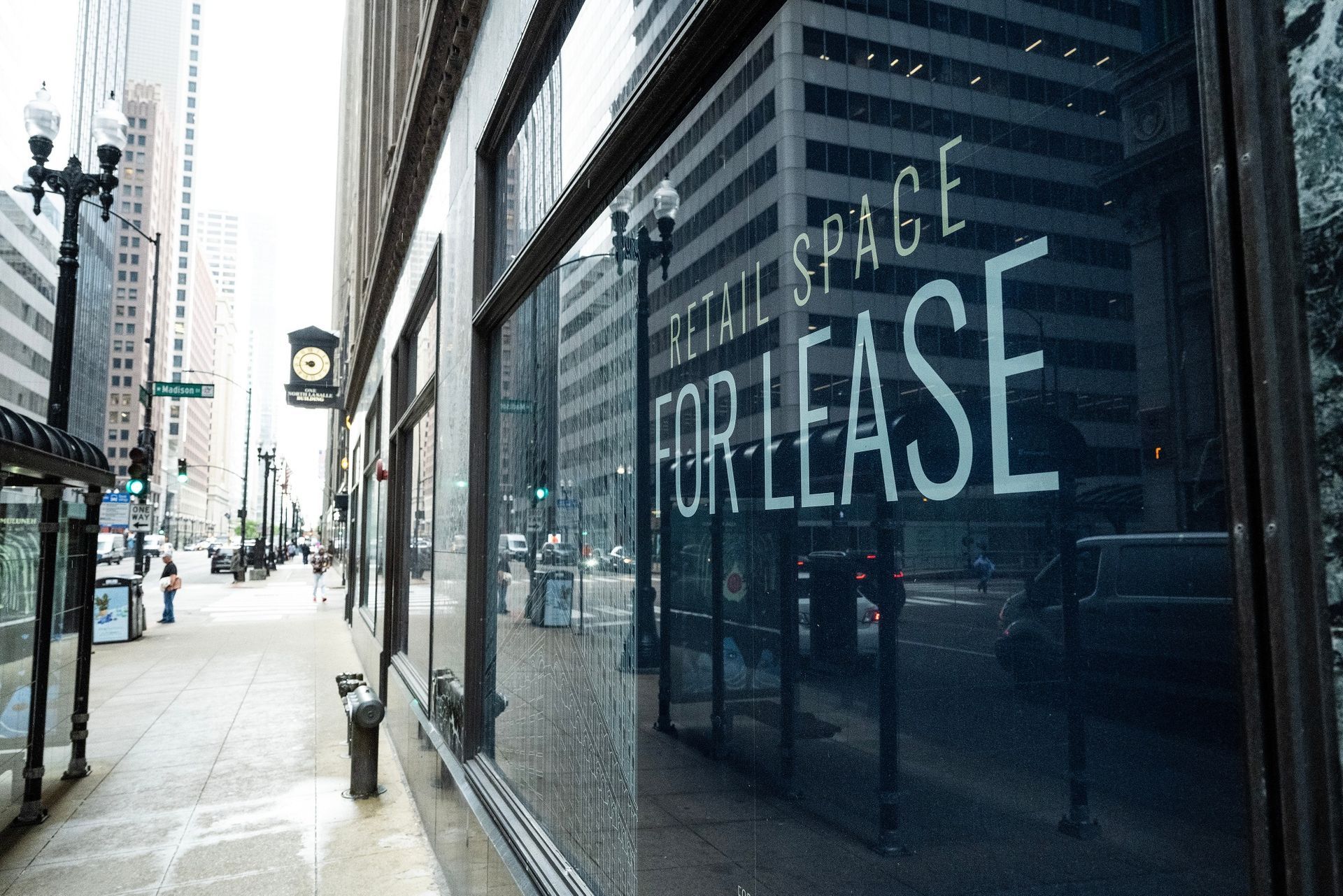 A store front with a sign that says retail space for lease