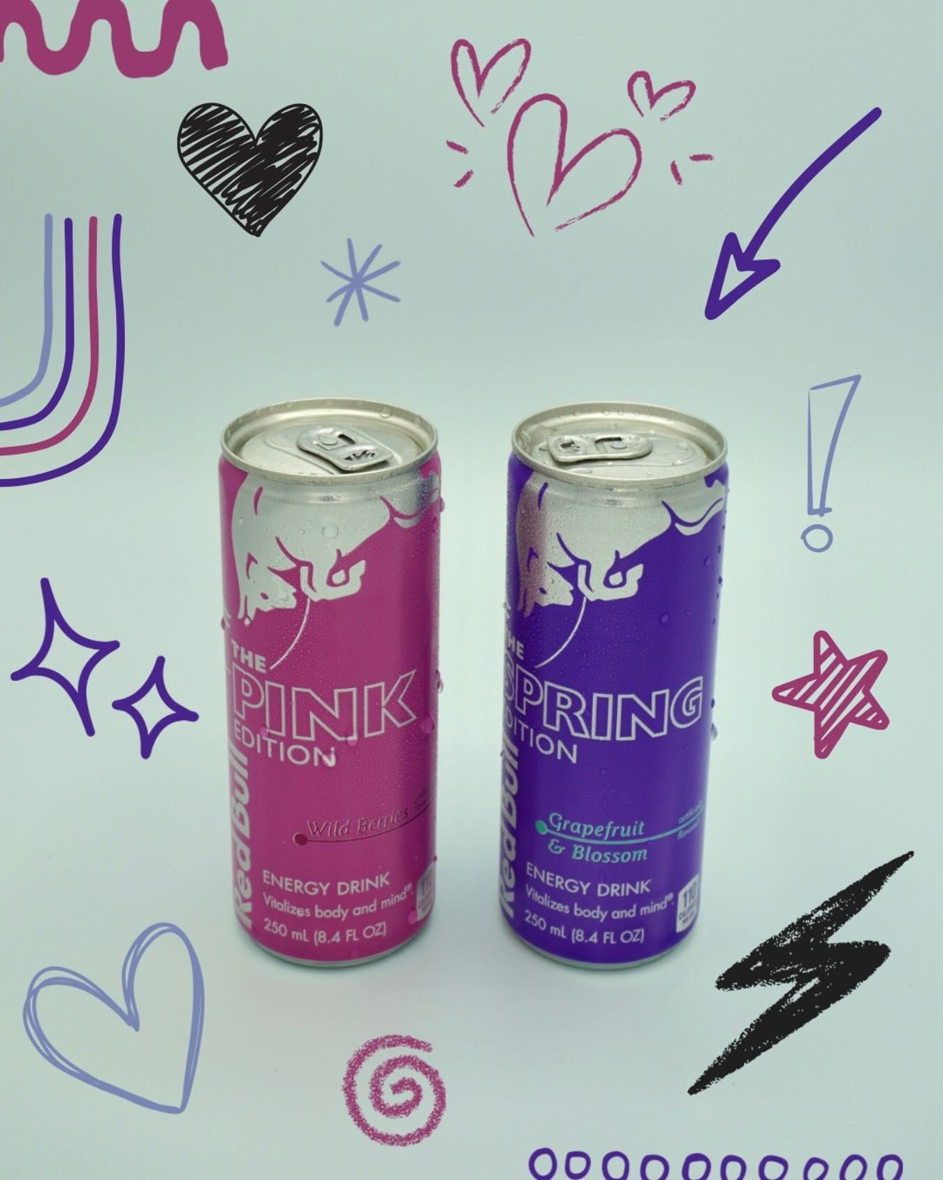 Two Red Bull cans: pink 
