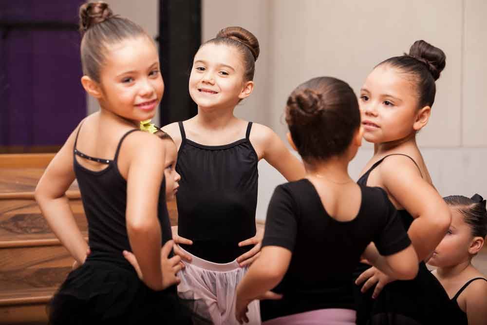 young ballerinas warming up