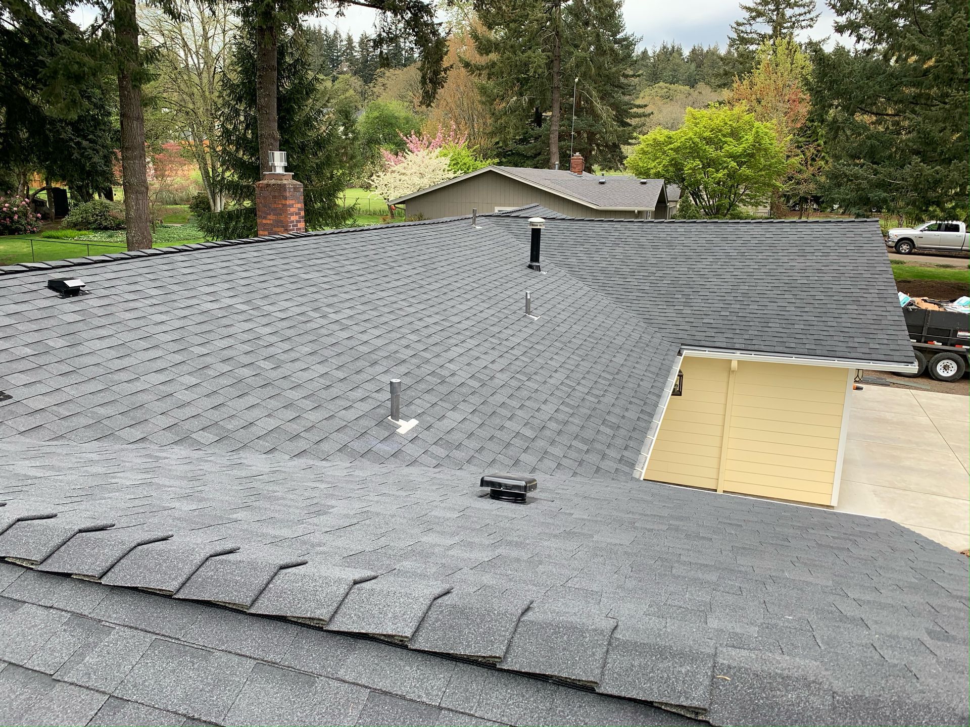 A roof of a house with a lot of shingles on it.