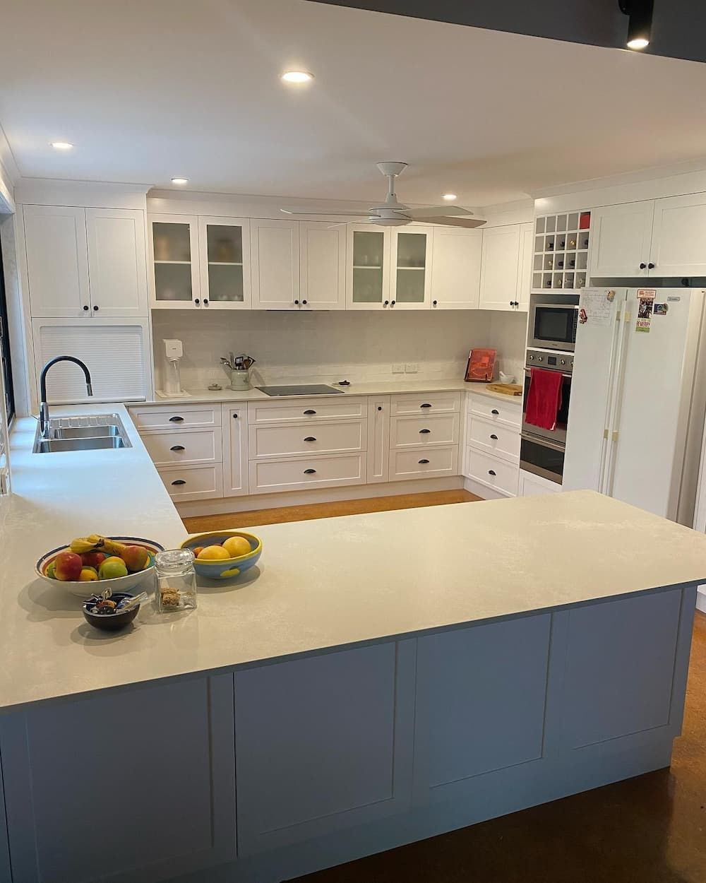 A Modern Kitchen With White Cabinets