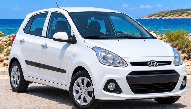Witte Hyundai Grand i10 huurauto op Curaçao, vooraanzicht