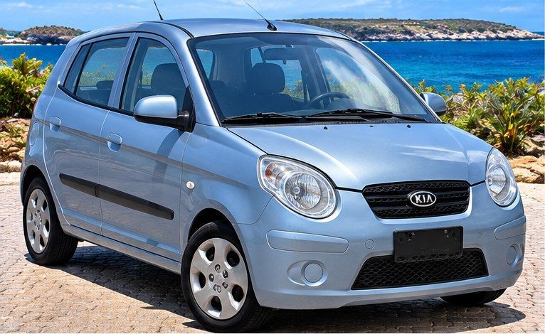 Lichtblauwe Kia Picanto huren op Curaçao, vooraanzicht