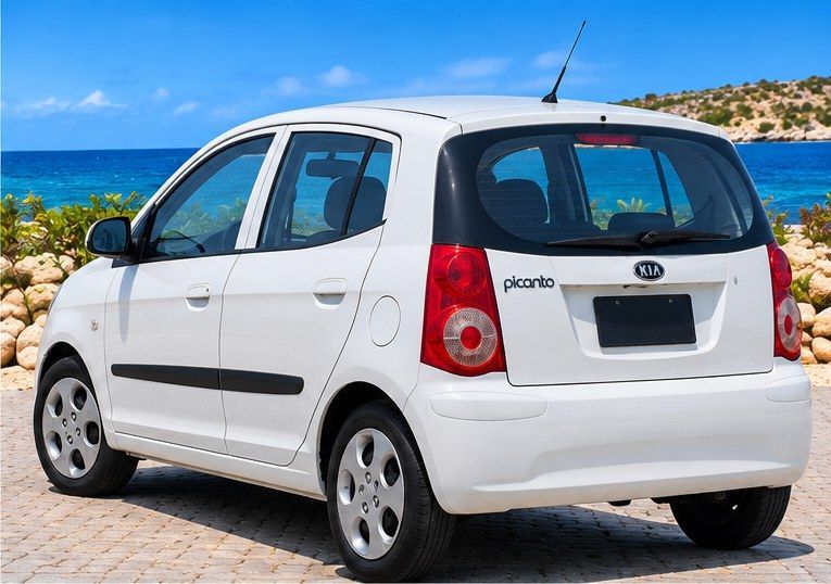 Witte Kia Picanto huurauto op Curaçao, achteraanzicht