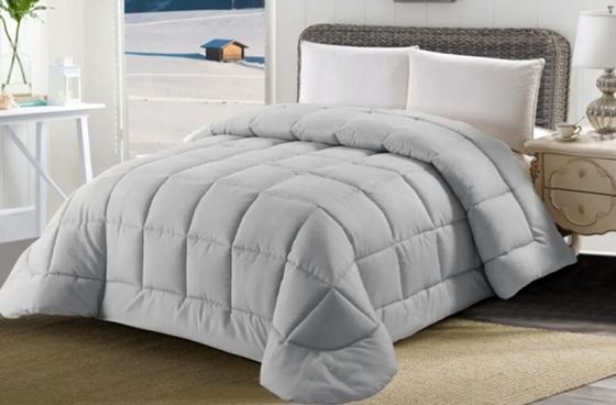 Letto con trapunta