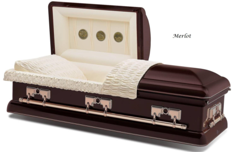 Brown and cream open casket with lace lining and silver handles